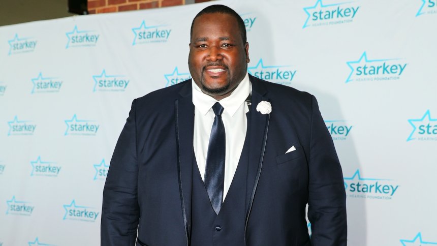 Quinton Aaron making progress in recovery from spinal stroke, disappointed ‘spiritual wife’ is married to another man