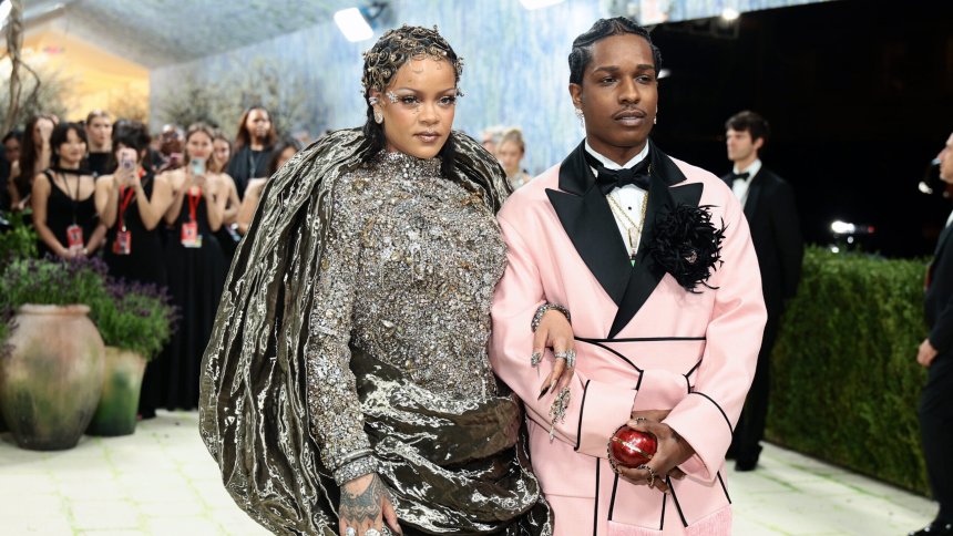 Rihanna and A$AP Rocky arrive fashionably late and fully in style at the Met Gala