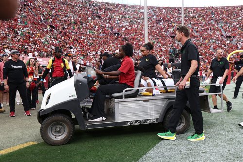 Dante Moore leaves Oregon-USC game in an ambulance, evaluated at local hospital