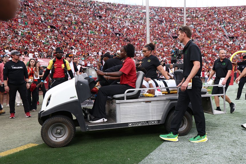 Dante Moore leaves Oregon-USC game in an ambulance, evaluated at local hospital
